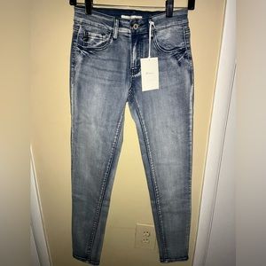 Medium washed low rise skinny jeans
